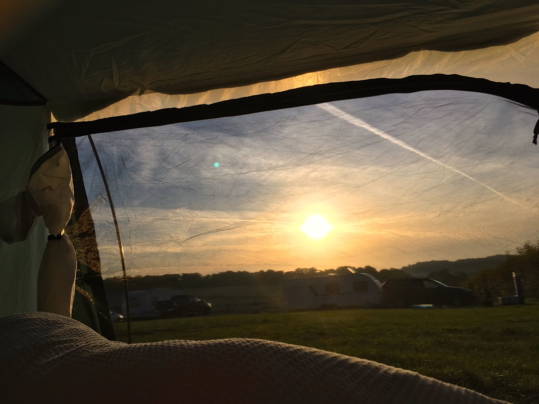 View of morning sun from within tent