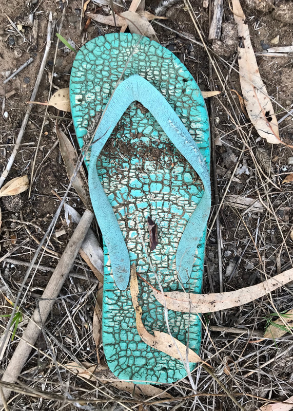 Very old aqua thong or flip flop