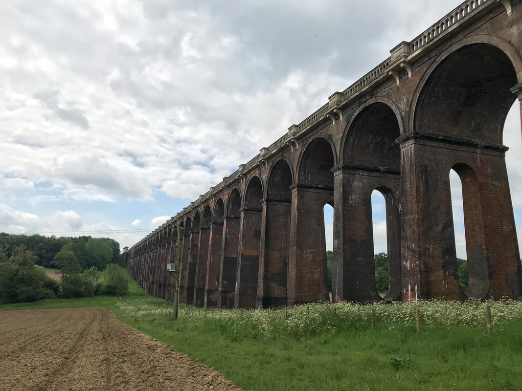 tall brick viaduct with arches