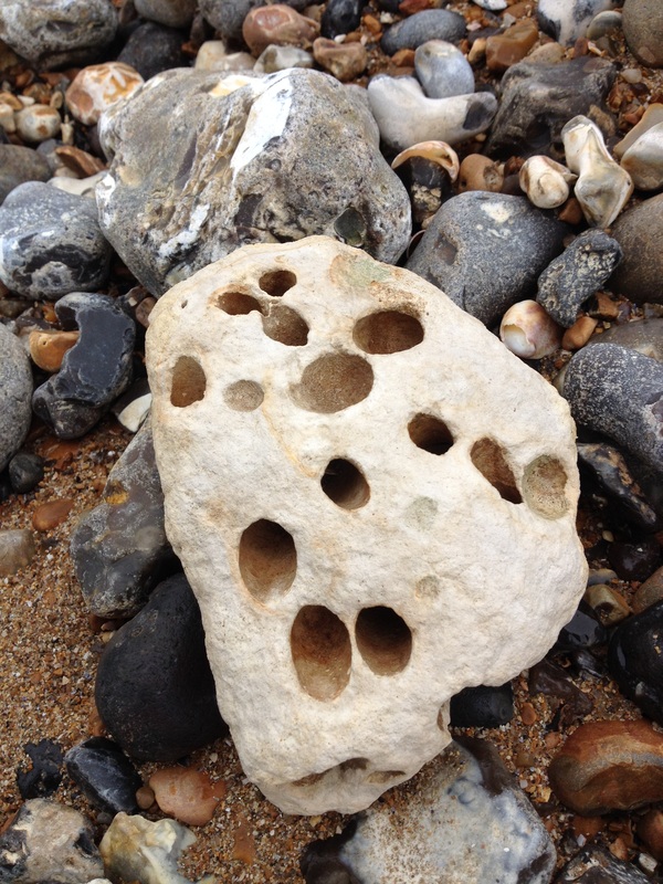 Stone with holes in it