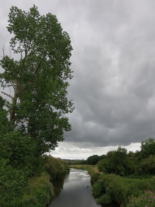 river and grey clouds