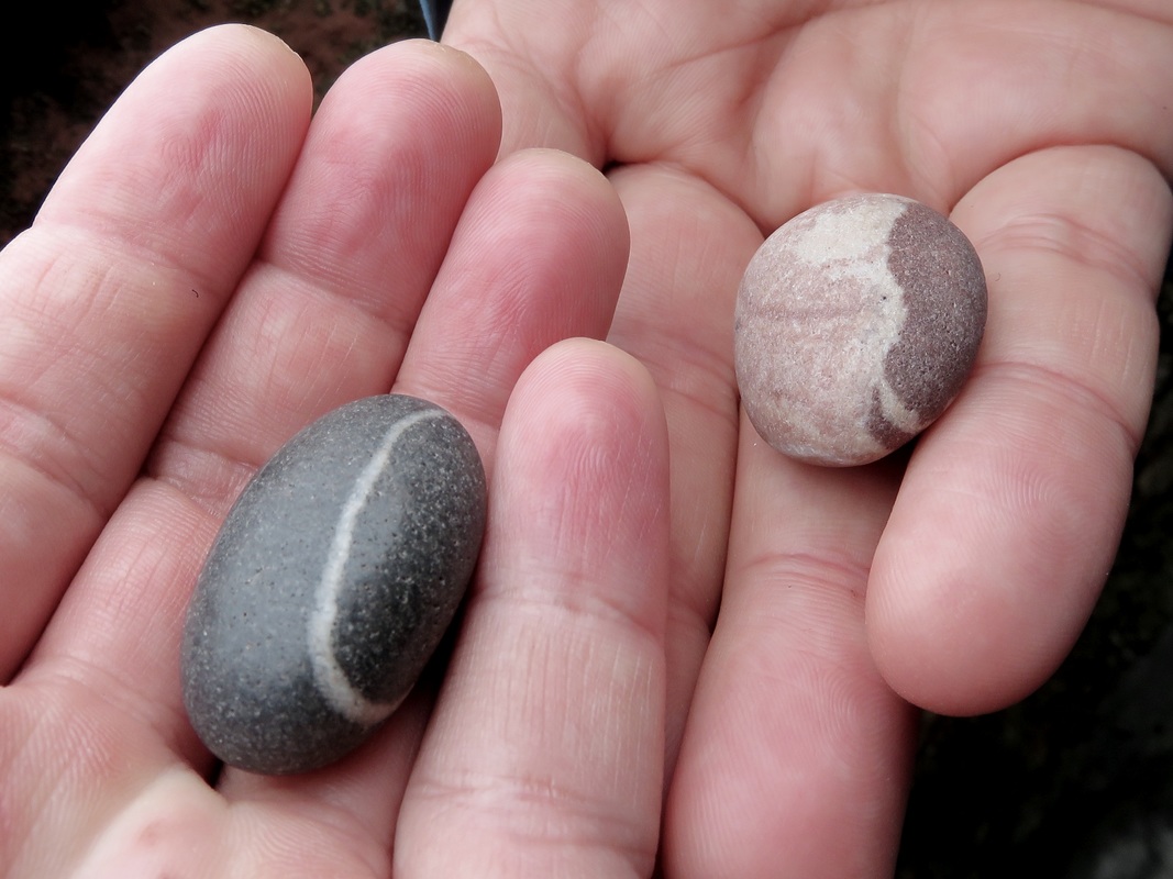 pebbles in hands