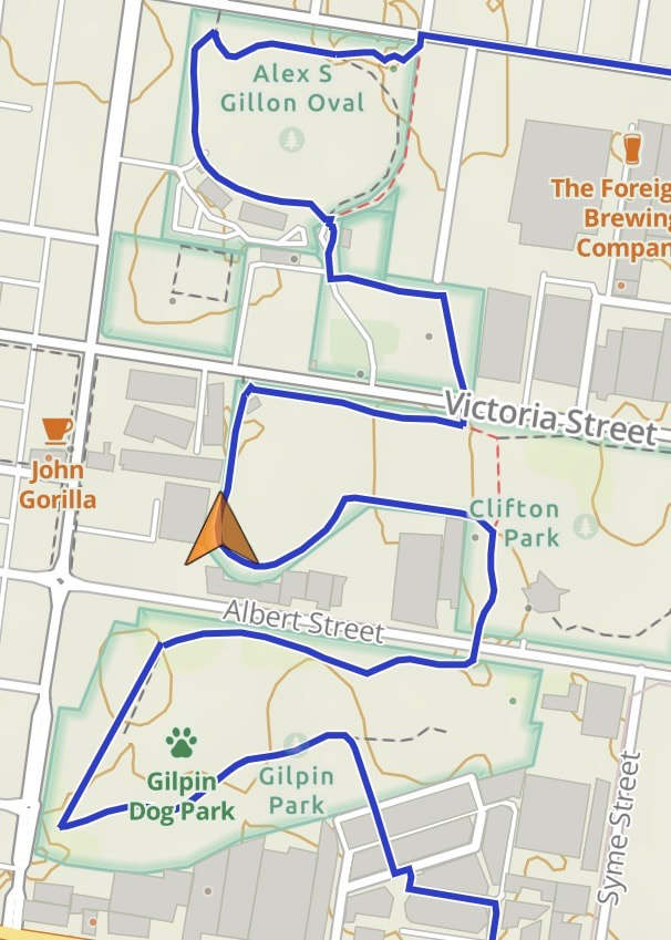 Map with a dark blue line twisting through several parks