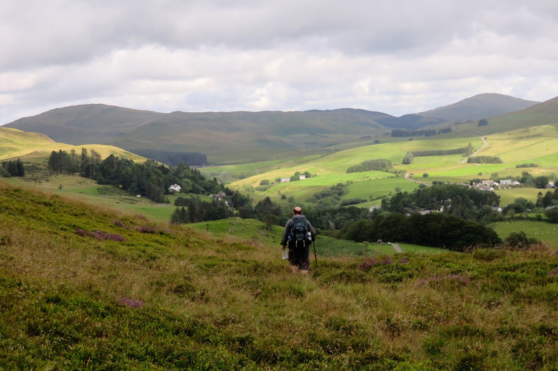 Mid-Wales landscape and hiker