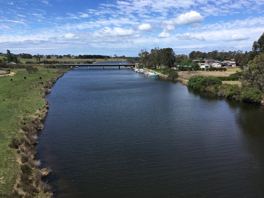 Wide river and small town view from bridge