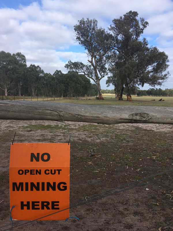 Orange anti-mine sign