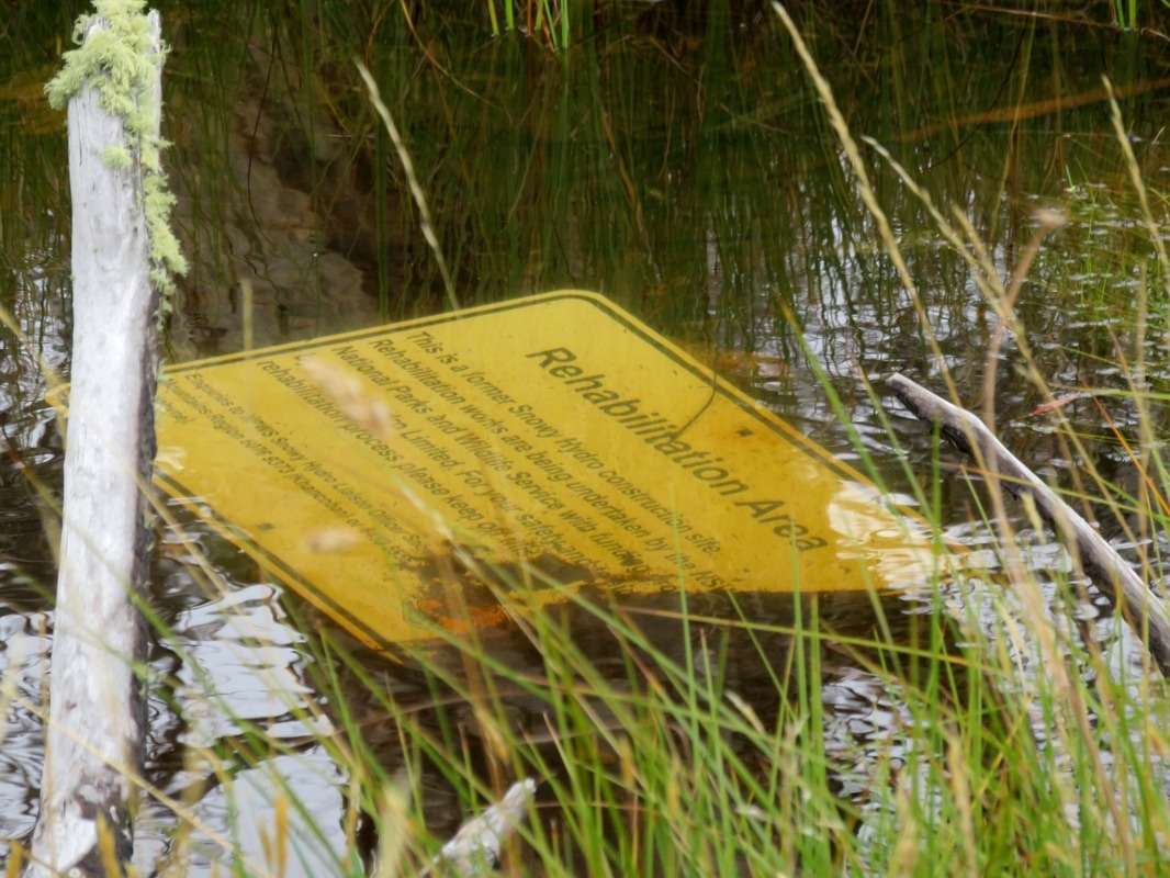 Sign sunk in water